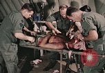 Image of wounded United States soldier Vietnam, 1969, second 28 stock footage video 65675022608