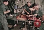 Image of wounded United States soldier Vietnam, 1969, second 30 stock footage video 65675022608