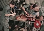 Image of wounded United States soldier Vietnam, 1969, second 33 stock footage video 65675022608
