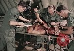Image of wounded United States soldier Vietnam, 1969, second 34 stock footage video 65675022608