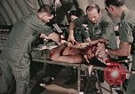 Image of wounded United States soldier Vietnam, 1969, second 35 stock footage video 65675022608
