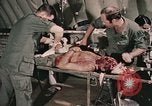 Image of wounded United States soldier Vietnam, 1969, second 37 stock footage video 65675022608