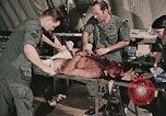 Image of wounded United States soldier Vietnam, 1969, second 38 stock footage video 65675022608