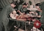 Image of wounded United States soldier Vietnam, 1969, second 40 stock footage video 65675022608