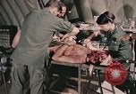 Image of wounded United States soldier Vietnam, 1969, second 42 stock footage video 65675022608
