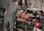 Image of wounded United States soldier Vietnam, 1969, second 43 stock footage video 65675022608