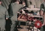 Image of wounded United States soldier Vietnam, 1969, second 45 stock footage video 65675022608