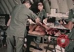Image of wounded United States soldier Vietnam, 1969, second 47 stock footage video 65675022608