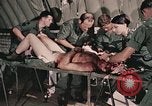 Image of wounded United States soldier Vietnam, 1969, second 55 stock footage video 65675022608