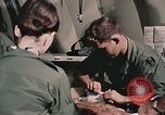 Image of wounded United States soldier Vietnam, 1969, second 61 stock footage video 65675022608