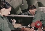Image of wounded United States soldier Vietnam, 1969, second 62 stock footage video 65675022608