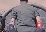 Image of wounded United States soldier Vietnam, 1969, second 14 stock footage video 65675022609