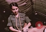 Image of wounded United States soldier Vietnam, 1969, second 25 stock footage video 65675022609