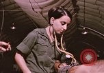 Image of wounded United States soldier Vietnam, 1969, second 34 stock footage video 65675022609