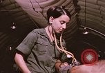 Image of wounded United States soldier Vietnam, 1969, second 35 stock footage video 65675022609