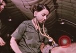 Image of wounded United States soldier Vietnam, 1969, second 36 stock footage video 65675022609