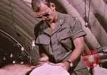 Image of wounded United States soldier Vietnam, 1969, second 38 stock footage video 65675022609