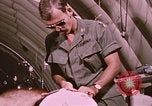 Image of wounded United States soldier Vietnam, 1969, second 39 stock footage video 65675022609