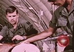 Image of wounded United States soldier Vietnam, 1969, second 48 stock footage video 65675022609