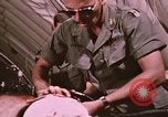 Image of wounded United States soldier Vietnam, 1969, second 52 stock footage video 65675022609