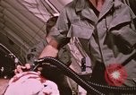 Image of wounded United States soldier Vietnam, 1969, second 53 stock footage video 65675022609