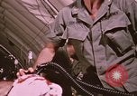 Image of wounded United States soldier Vietnam, 1969, second 55 stock footage video 65675022609