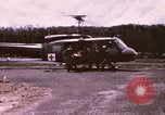 Image of operation on wounded soldier Vietnam, 1969, second 5 stock footage video 65675022610