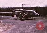 Image of operation on wounded soldier Vietnam, 1969, second 6 stock footage video 65675022610