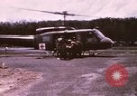 Image of operation on wounded soldier Vietnam, 1969, second 8 stock footage video 65675022610