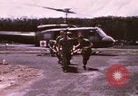 Image of operation on wounded soldier Vietnam, 1969, second 13 stock footage video 65675022610