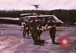 Image of operation on wounded soldier Vietnam, 1969, second 14 stock footage video 65675022610