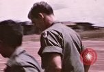 Image of operation on wounded soldier Vietnam, 1969, second 20 stock footage video 65675022610