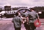 Image of operation on wounded soldier Vietnam, 1969, second 24 stock footage video 65675022610