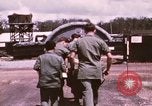 Image of operation on wounded soldier Vietnam, 1969, second 25 stock footage video 65675022610