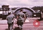 Image of operation on wounded soldier Vietnam, 1969, second 28 stock footage video 65675022610