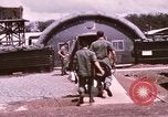 Image of operation on wounded soldier Vietnam, 1969, second 32 stock footage video 65675022610