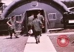 Image of operation on wounded soldier Vietnam, 1969, second 36 stock footage video 65675022610