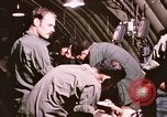 Image of operation on wounded soldier Vietnam, 1969, second 51 stock footage video 65675022610