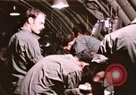 Image of operation on wounded soldier Vietnam, 1969, second 52 stock footage video 65675022610