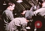 Image of operation on wounded soldier Vietnam, 1969, second 53 stock footage video 65675022610