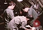 Image of operation on wounded soldier Vietnam, 1969, second 56 stock footage video 65675022610