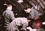 Image of operation on wounded soldier Vietnam, 1969, second 57 stock footage video 65675022610
