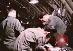 Image of operation on wounded soldier Vietnam, 1969, second 59 stock footage video 65675022610