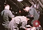 Image of operation on wounded soldier Vietnam, 1969, second 61 stock footage video 65675022610