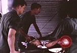 Image of wounded United States soldier Vietnam, 1969, second 33 stock footage video 65675022611