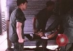 Image of wounded United States soldier Vietnam, 1969, second 34 stock footage video 65675022611