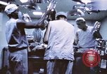Image of wounded United States soldier Vietnam, 1969, second 42 stock footage video 65675022611