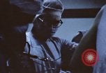 Image of wounded United States soldier Vietnam, 1969, second 44 stock footage video 65675022611