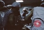 Image of wounded United States soldier Vietnam, 1969, second 50 stock footage video 65675022611