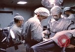 Image of wounded United States soldier Vietnam, 1969, second 3 stock footage video 65675022612